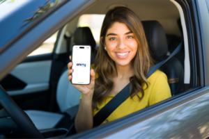 Driver shows Envoy America Rideshare Driver App on Mobile Device